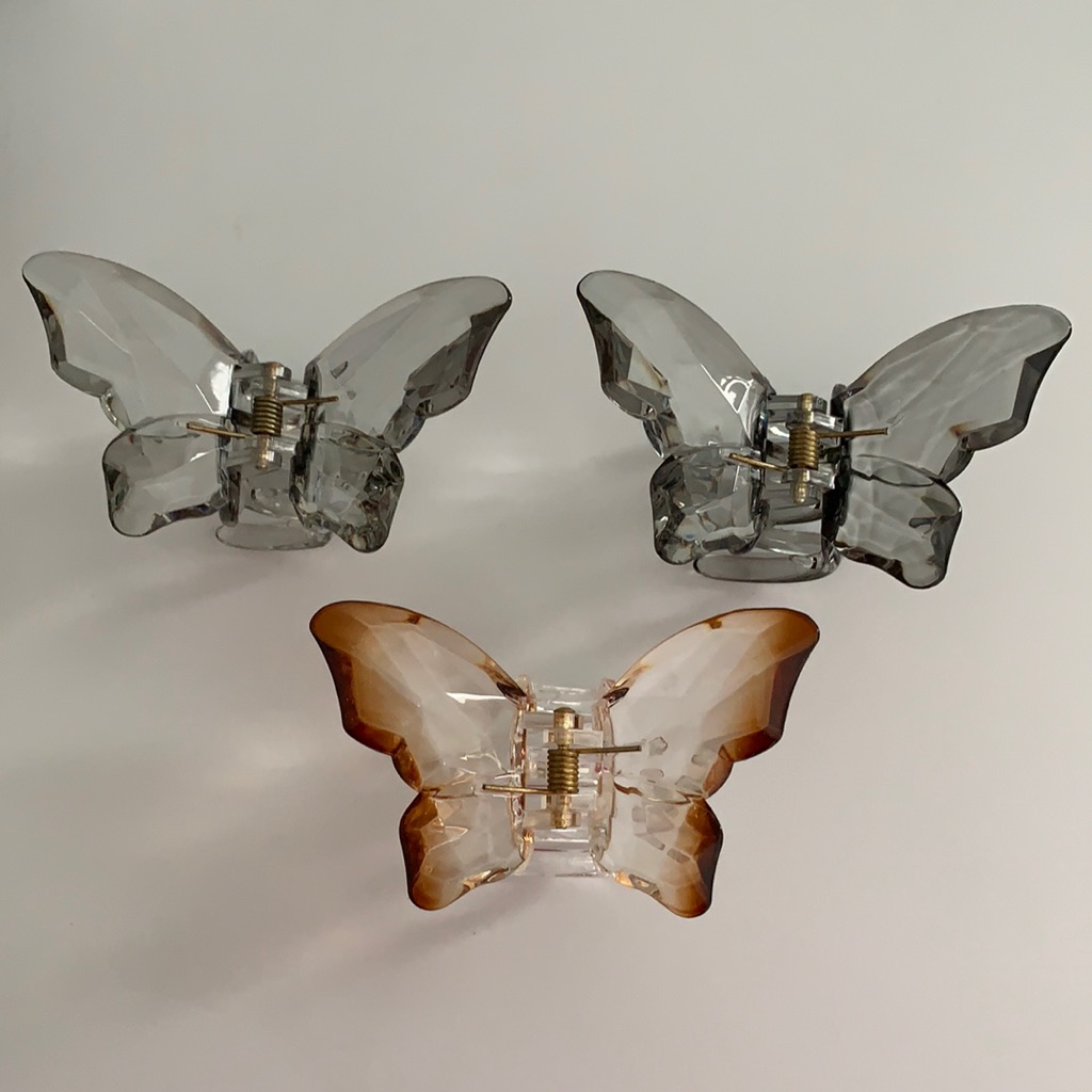 Three smoke and amber translucent butterfly claw clips